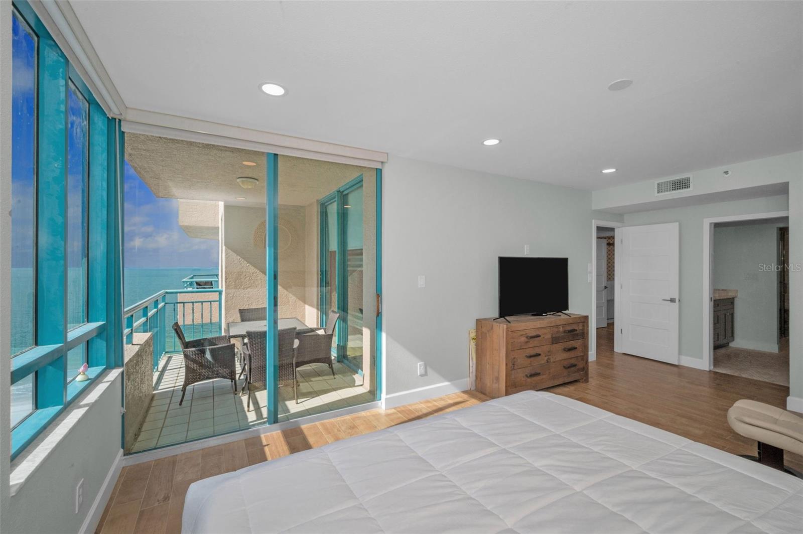Master Suite Retreat Scenic Surround to Aquamarine Panorama with Terrace Access. Features a Bath including, Dual Sink Vanity, Walk In Closet Dress Are