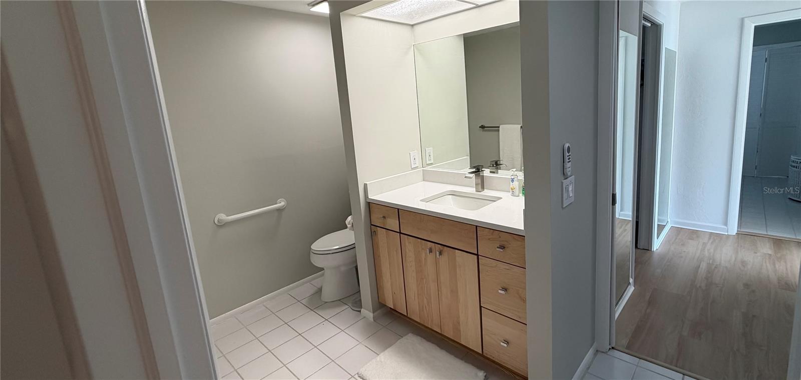 Gentleman's bath has a large shower.