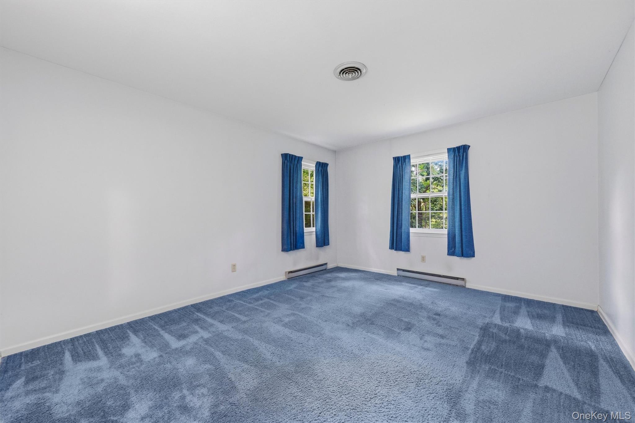 Bedroom 3 with HW floors under carpet