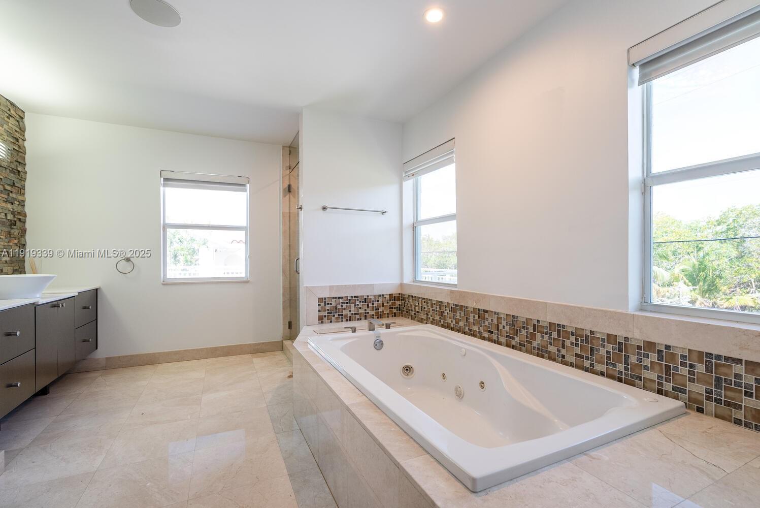 Main bathroom #3 with separated vanities