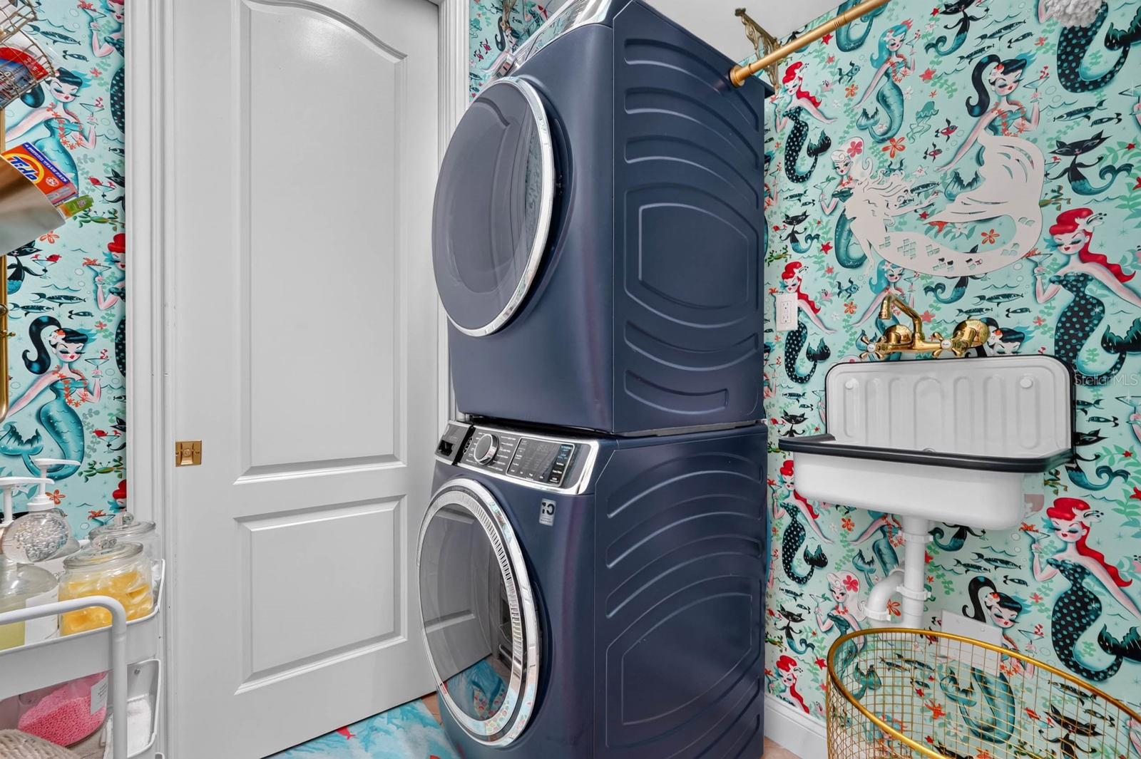 Upstairs laundry room close to primary suite. Large storage closet attached.