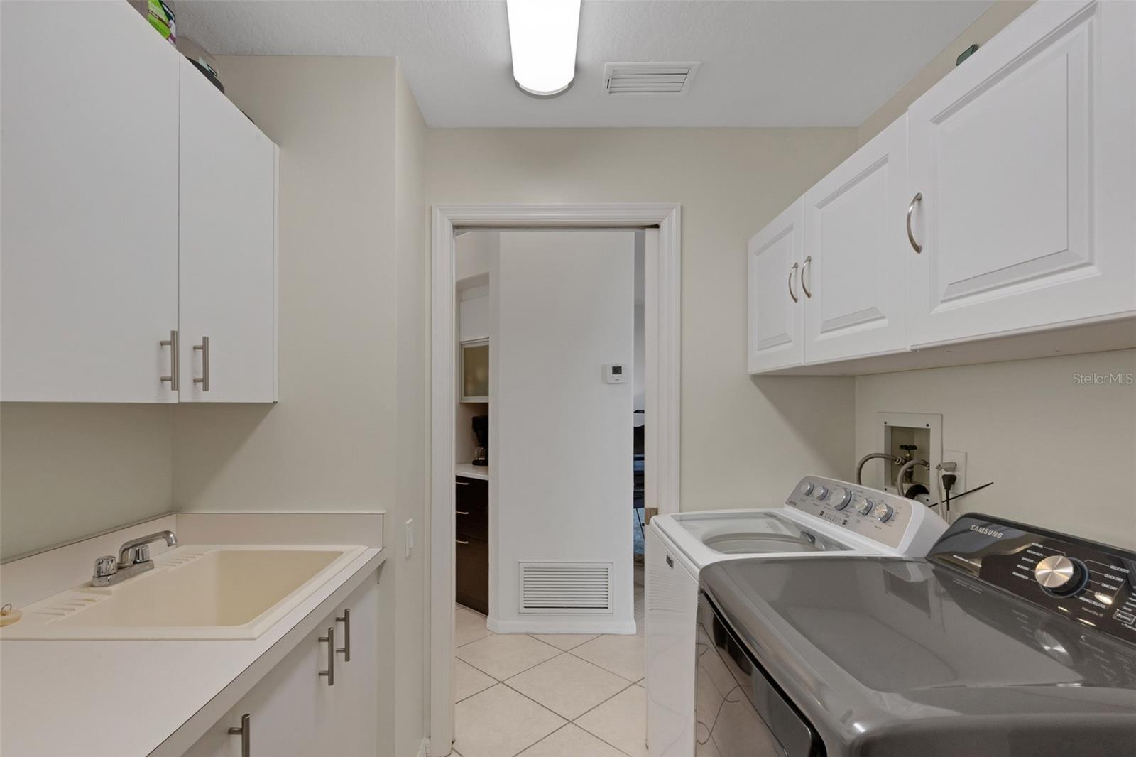 Laundry room with sink and countertop