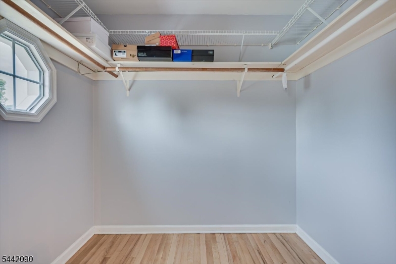 Primary Bedroom Walk in Closet