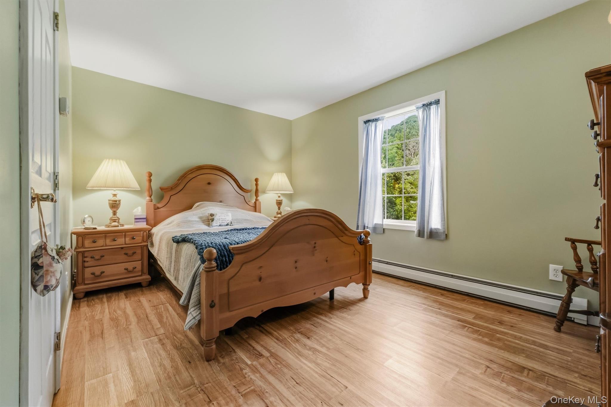 The 2nd bedroom is spacious and bright