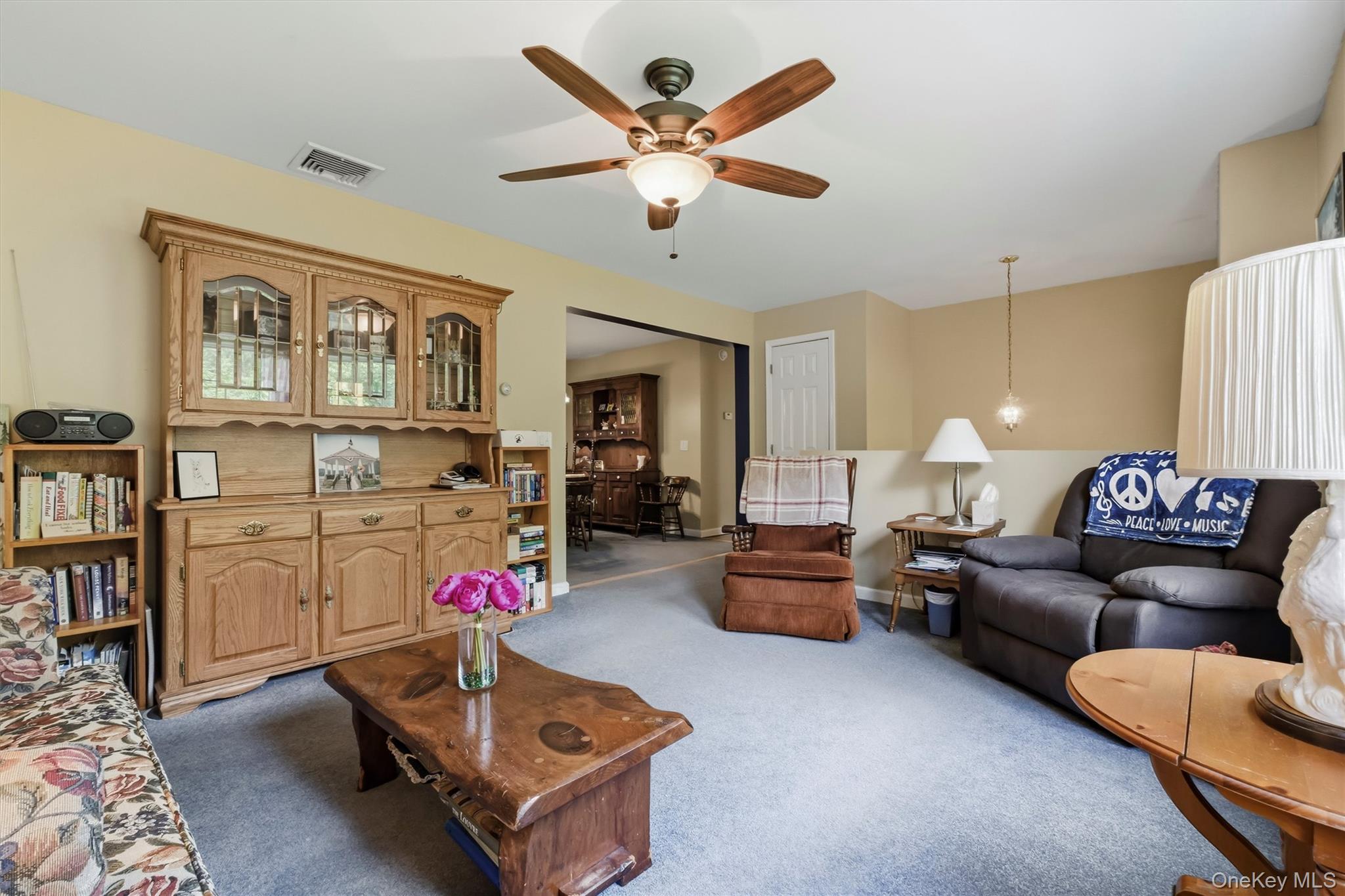 The living room flows directly into the dining room for an open concept feel