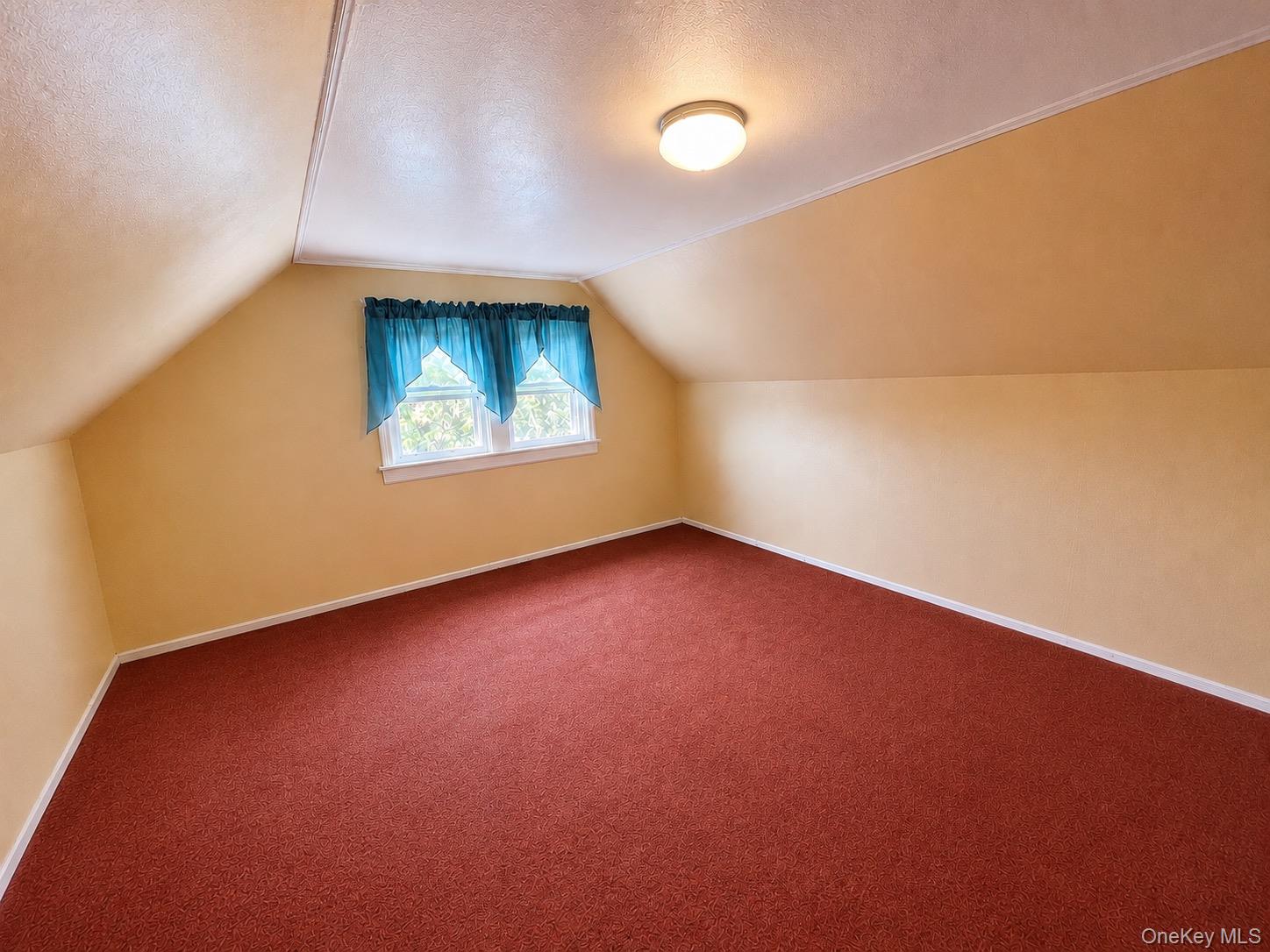Virtually enhanced photo. Personal property and clutter have been digitally removed. Room dimensions and permanent features remain unchanged.