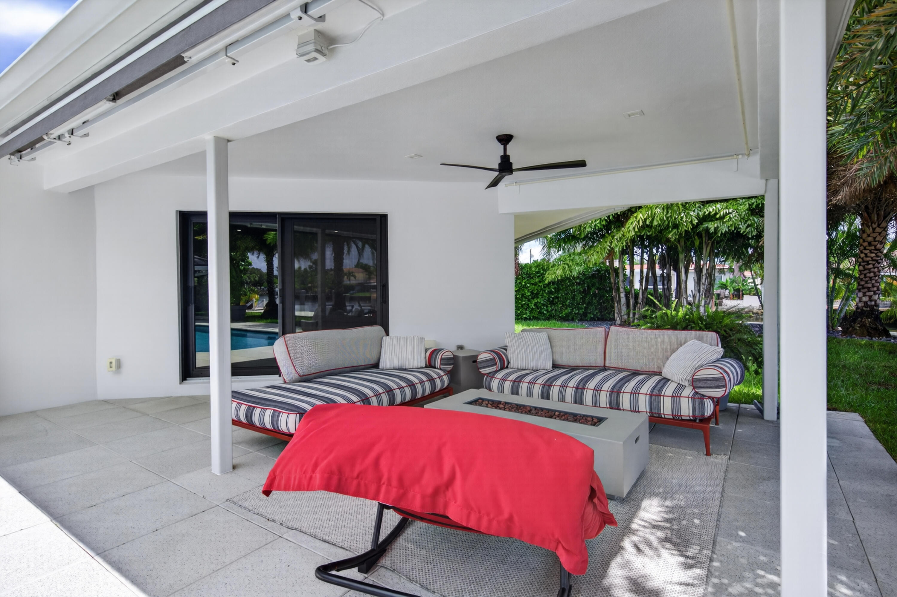 Covered outdoor living room to be enjoyed day and night