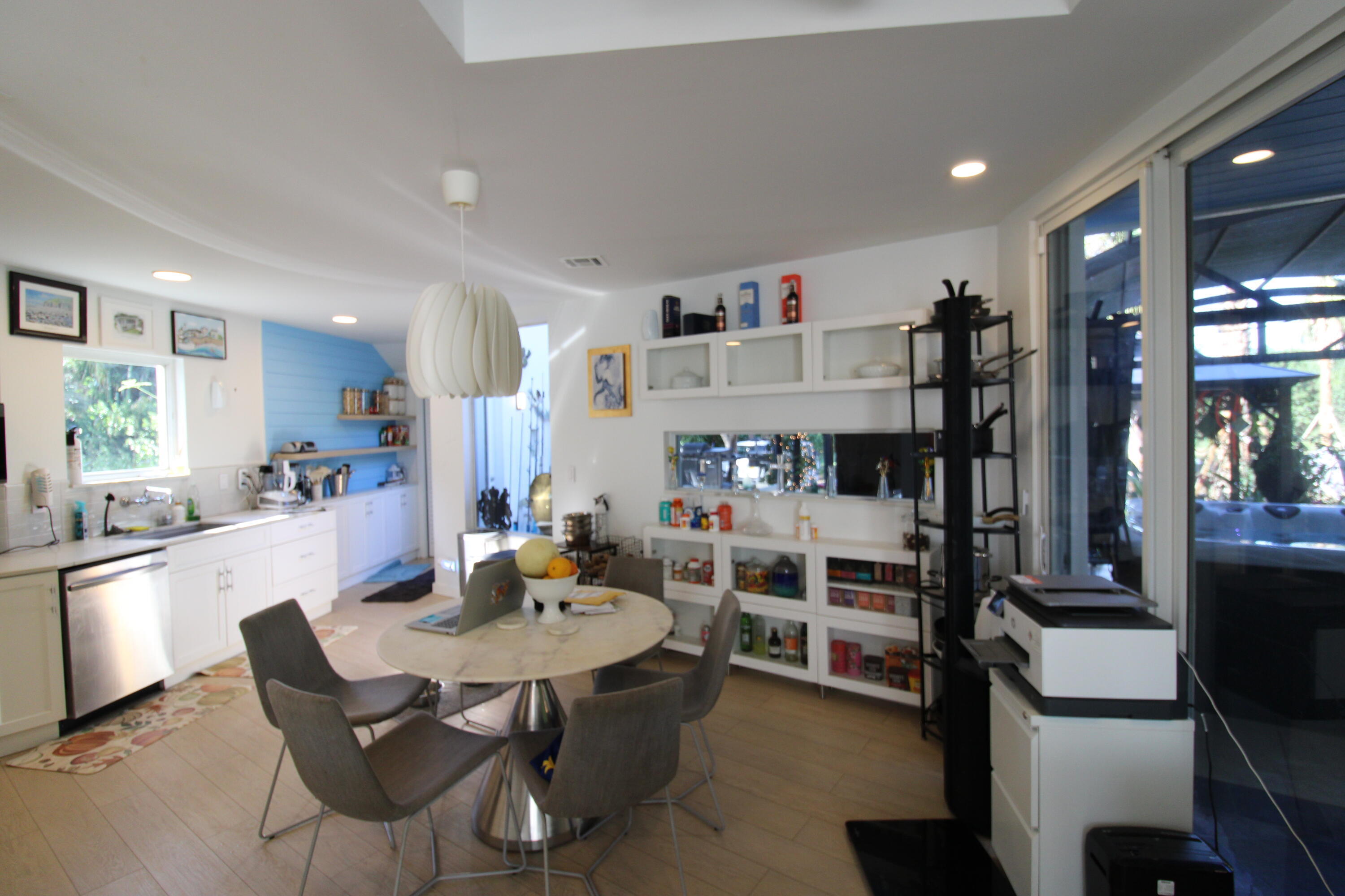 Kitchen leading to North patio leisure complex with Terracotta marble flooring