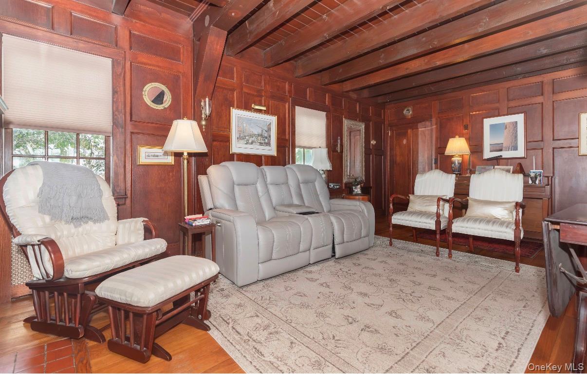 Custom built walls out of pine, beech and chestnut wood created with the marine feel of a classic ship.