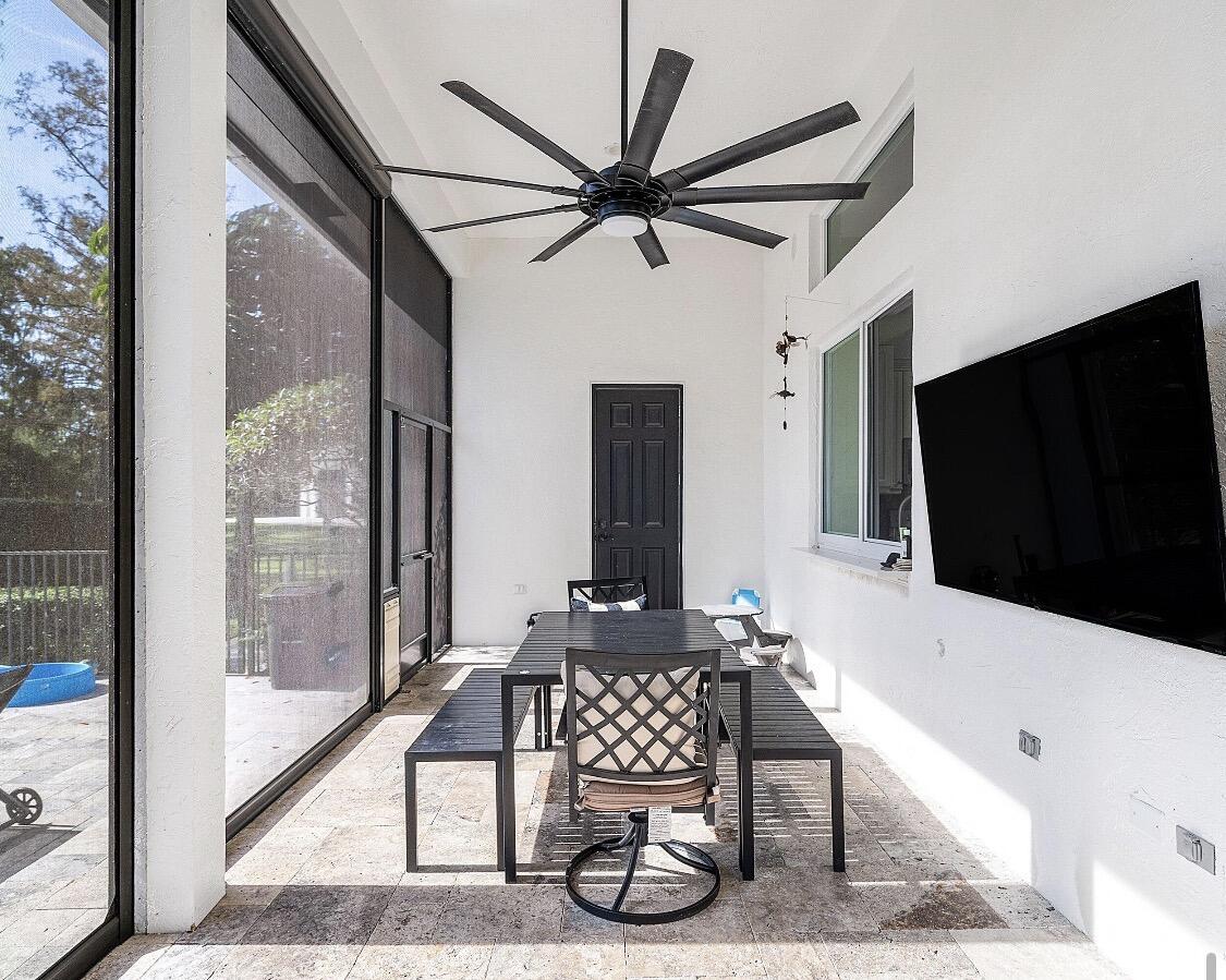Summer kitchen, just below the bottom of the picture frame is a hibachi grill and BBQ pit. Automatic roll up screens. Zero mosquitoes out here today.