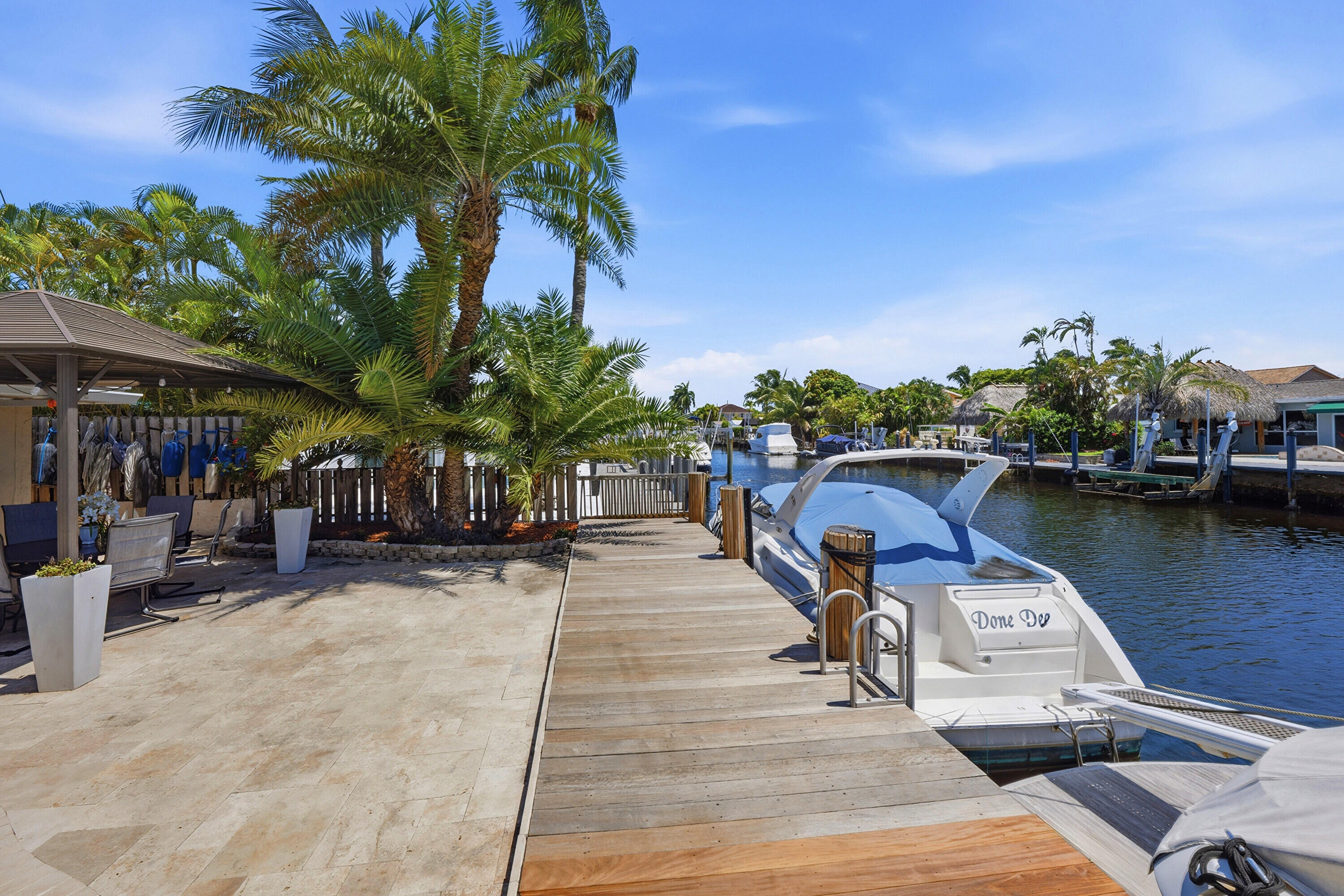 Your Ocean Access, Waterfront Lifestyle at it's Finest! 40' Dock, 70' Seawall, Freeform Pool with Rock Waterfall, Covered Patio Space for Fail Safe Ou