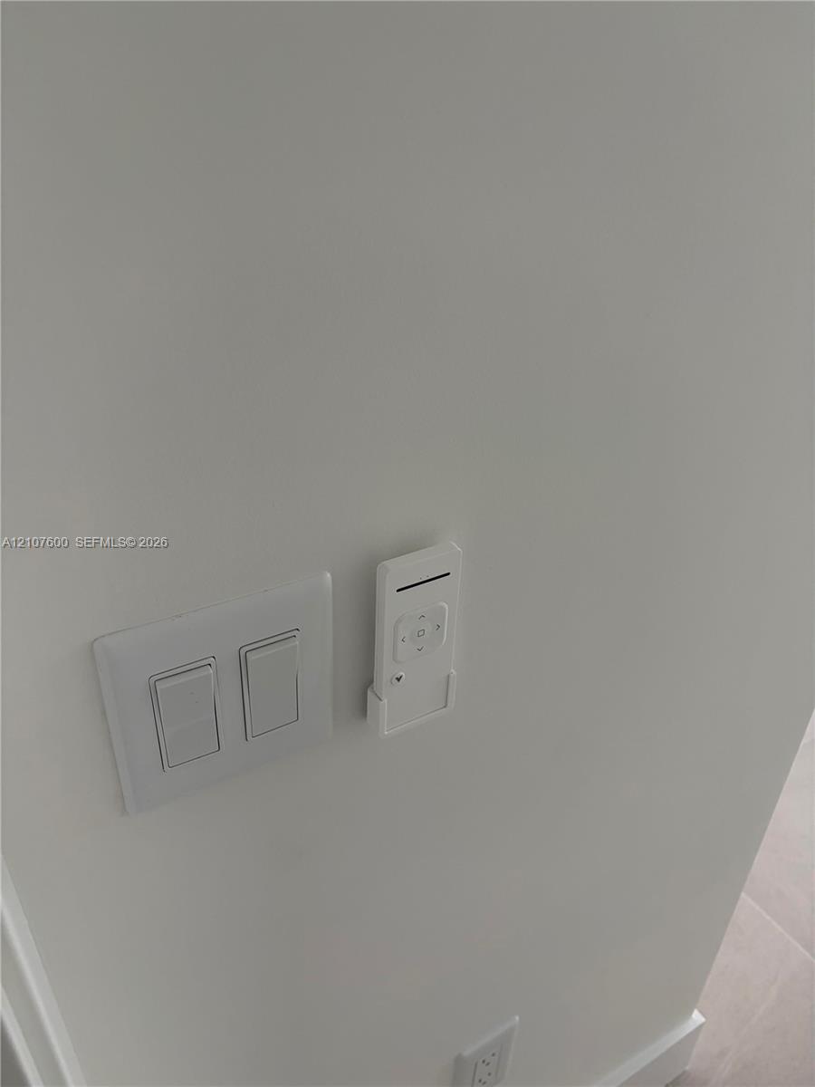 Wall-mounted remote control unit and dual rocker light switch