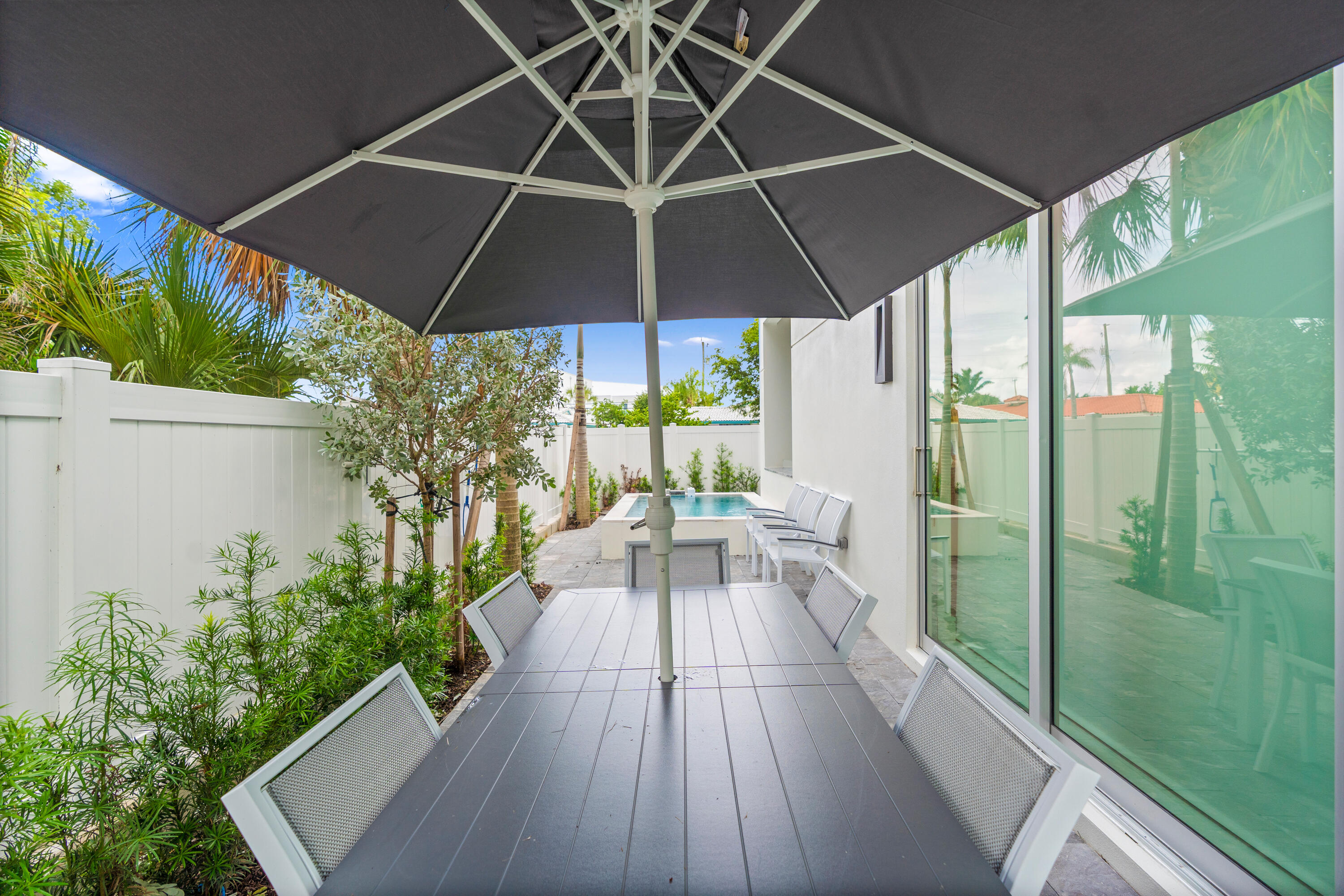 221 Shore Ct Patio Area Umbrella - A remarkable luxury townhome rental that redefines upscale living in the heart of Lauderdale By The Sea. This beaut