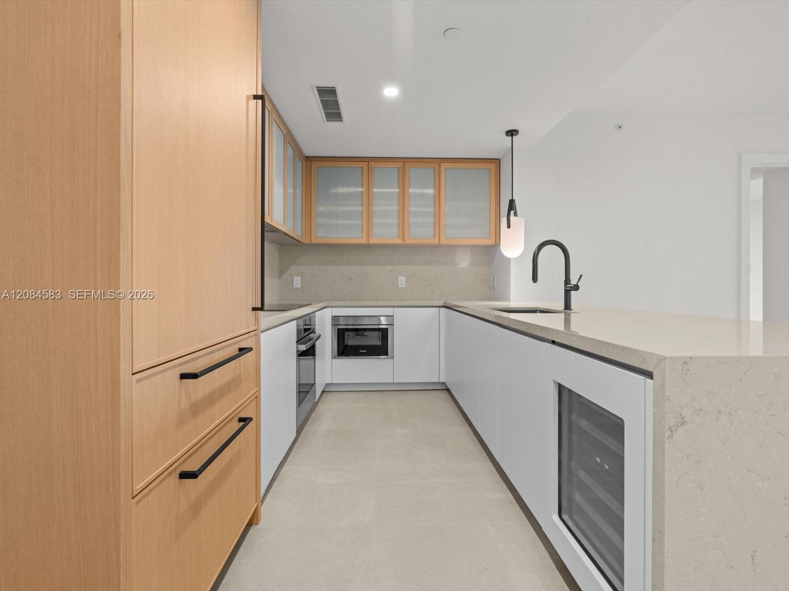 Kitchen island with built in wine cooler