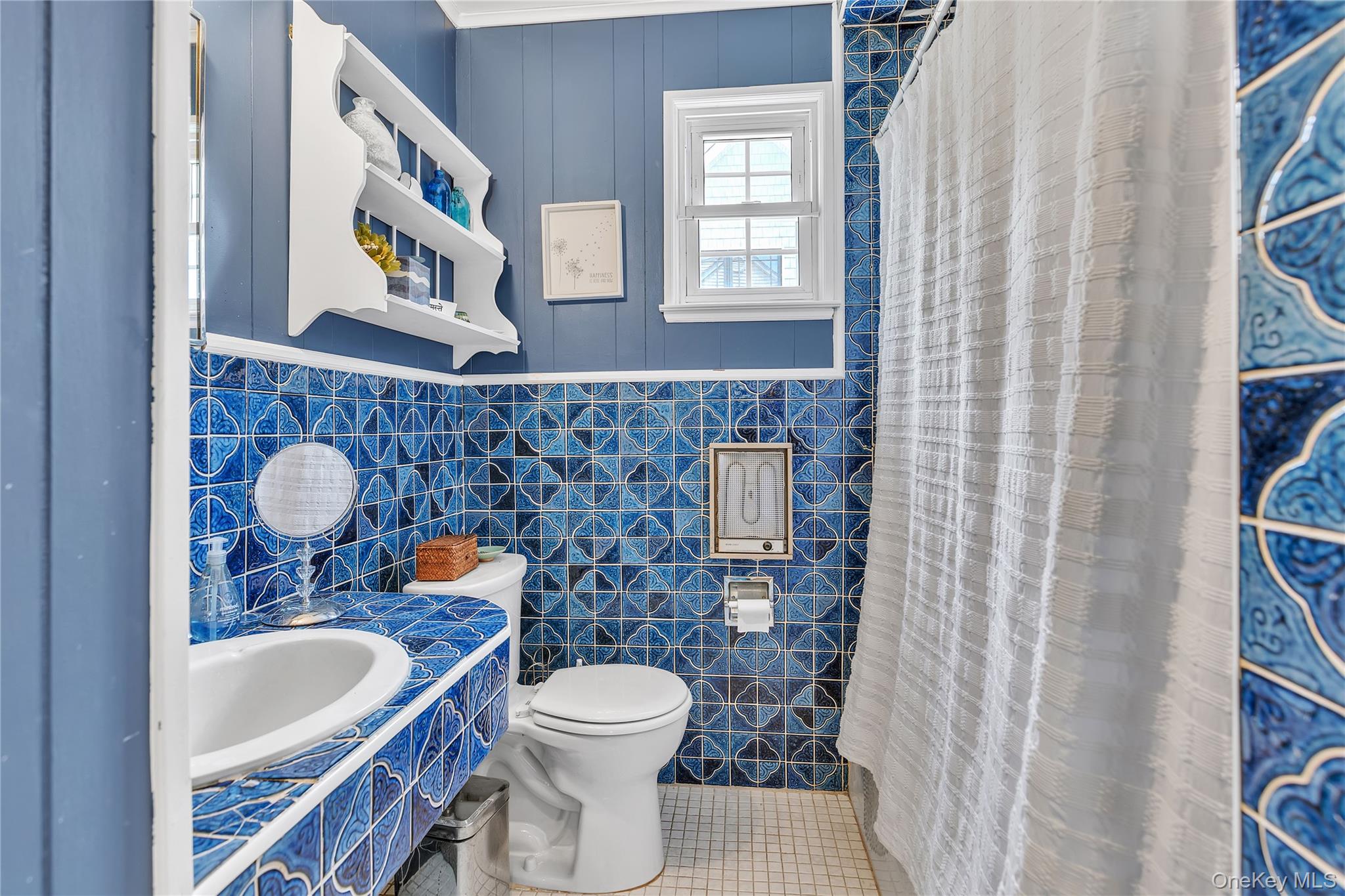 First floor full bathroom with tub
