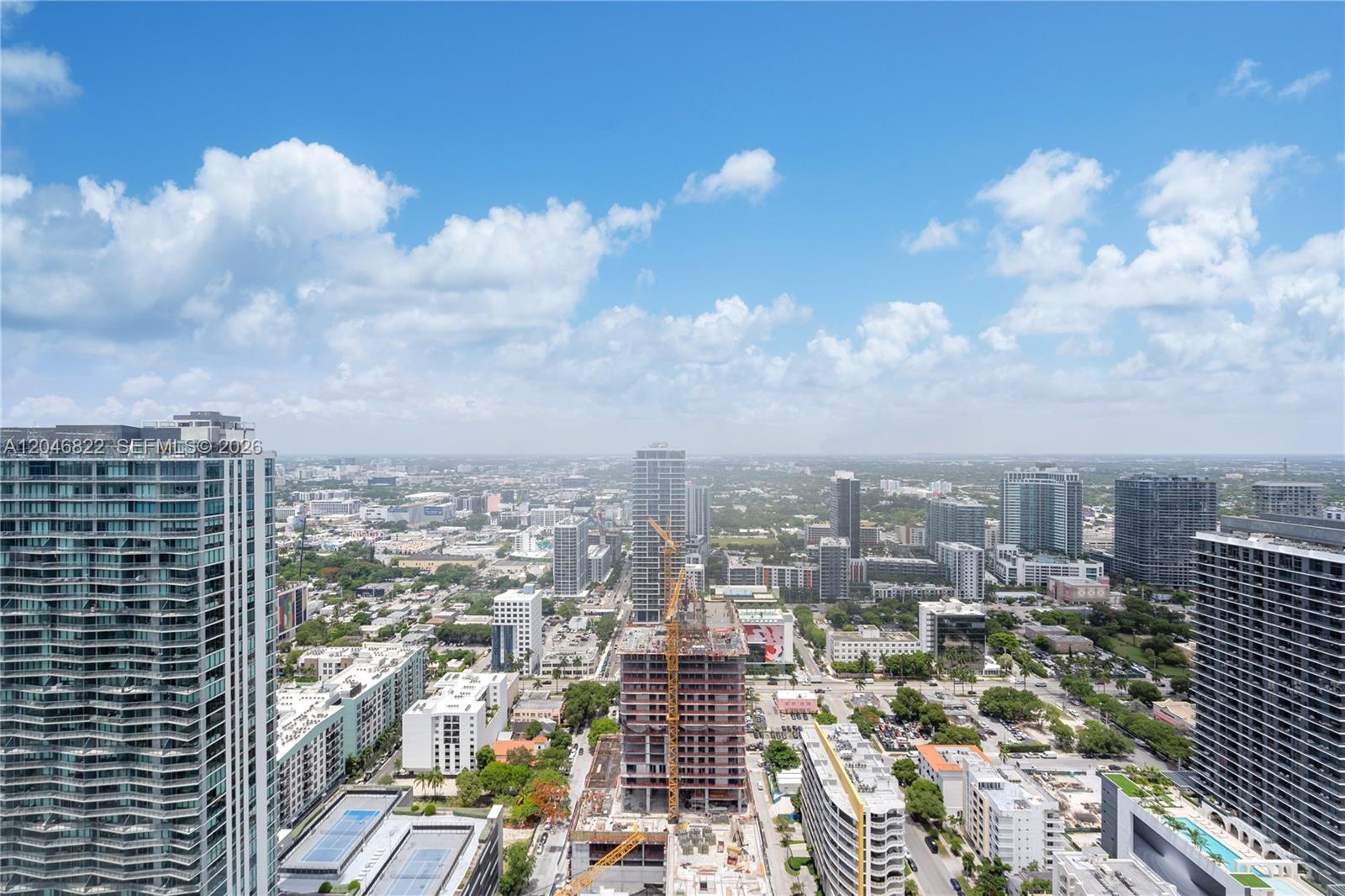 Aerial of the Biscayne Beach pool deck and bayfront setting