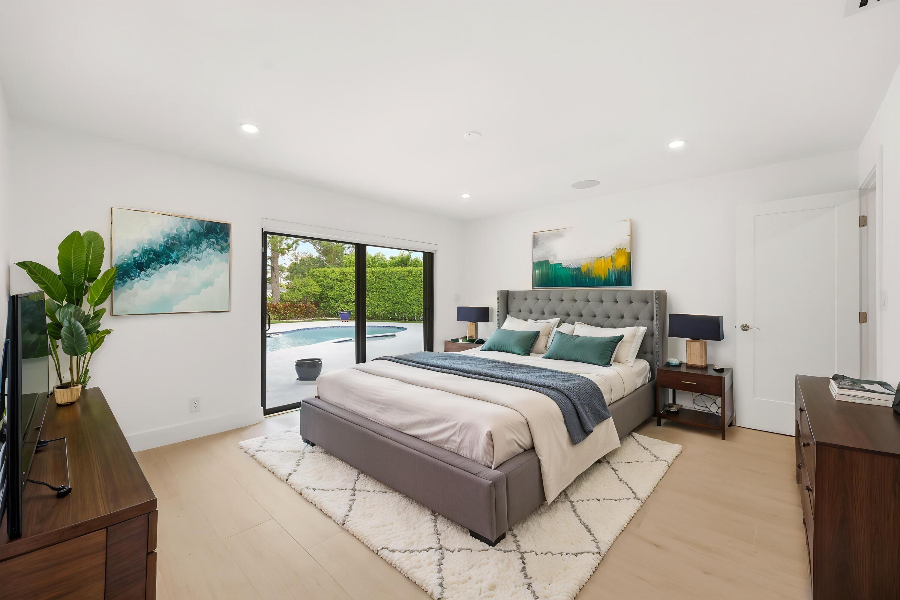 Designed as a true private guest retreat, this spacious suite offers exceptional comfort, privacy, and direct access to the backyard through oversized