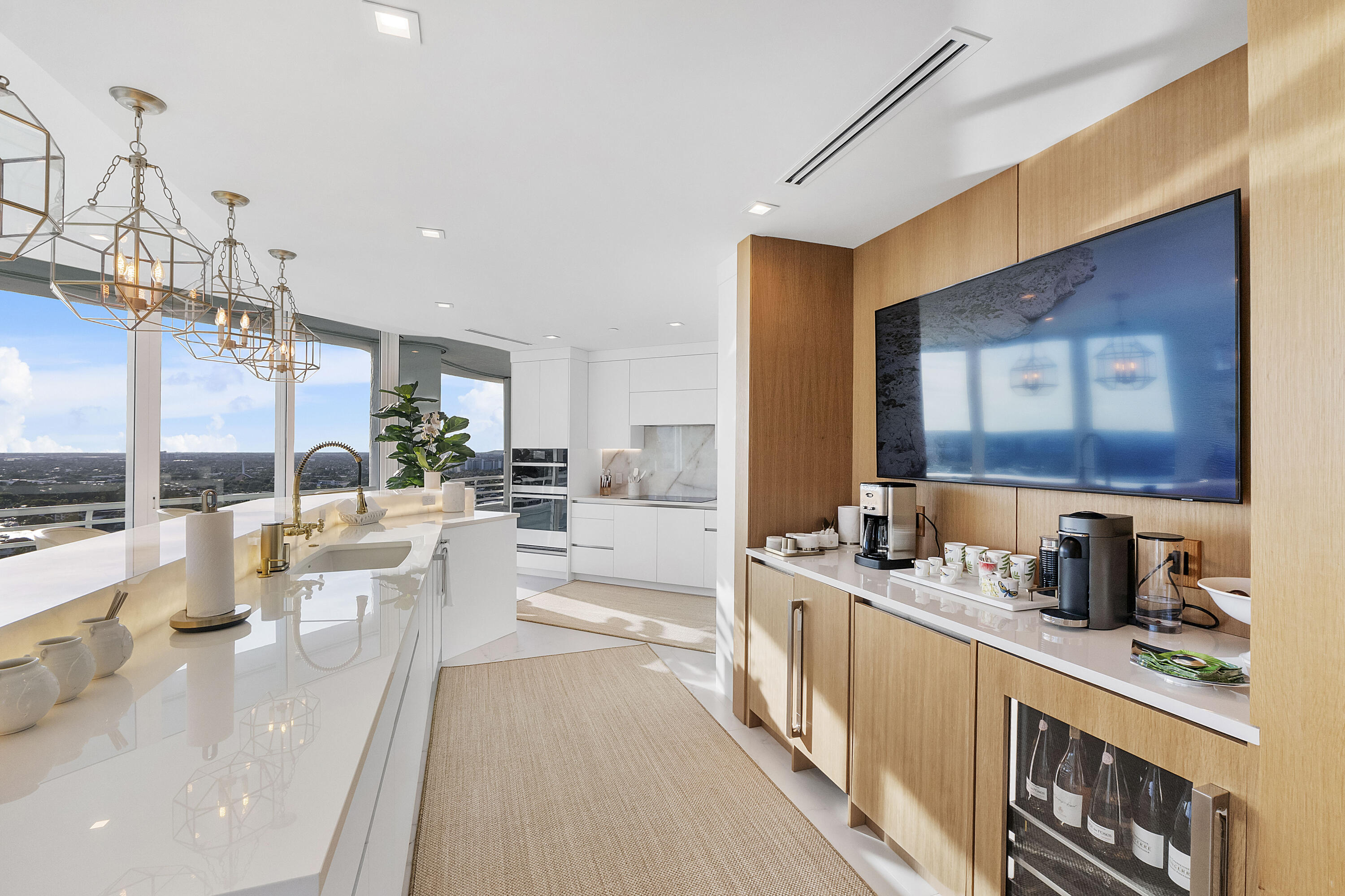 Designed for gracious living, this bespoke Tea & Coffee hospitality station elevates everyday moments with a dedicated tea and coffee bar, refrigerate