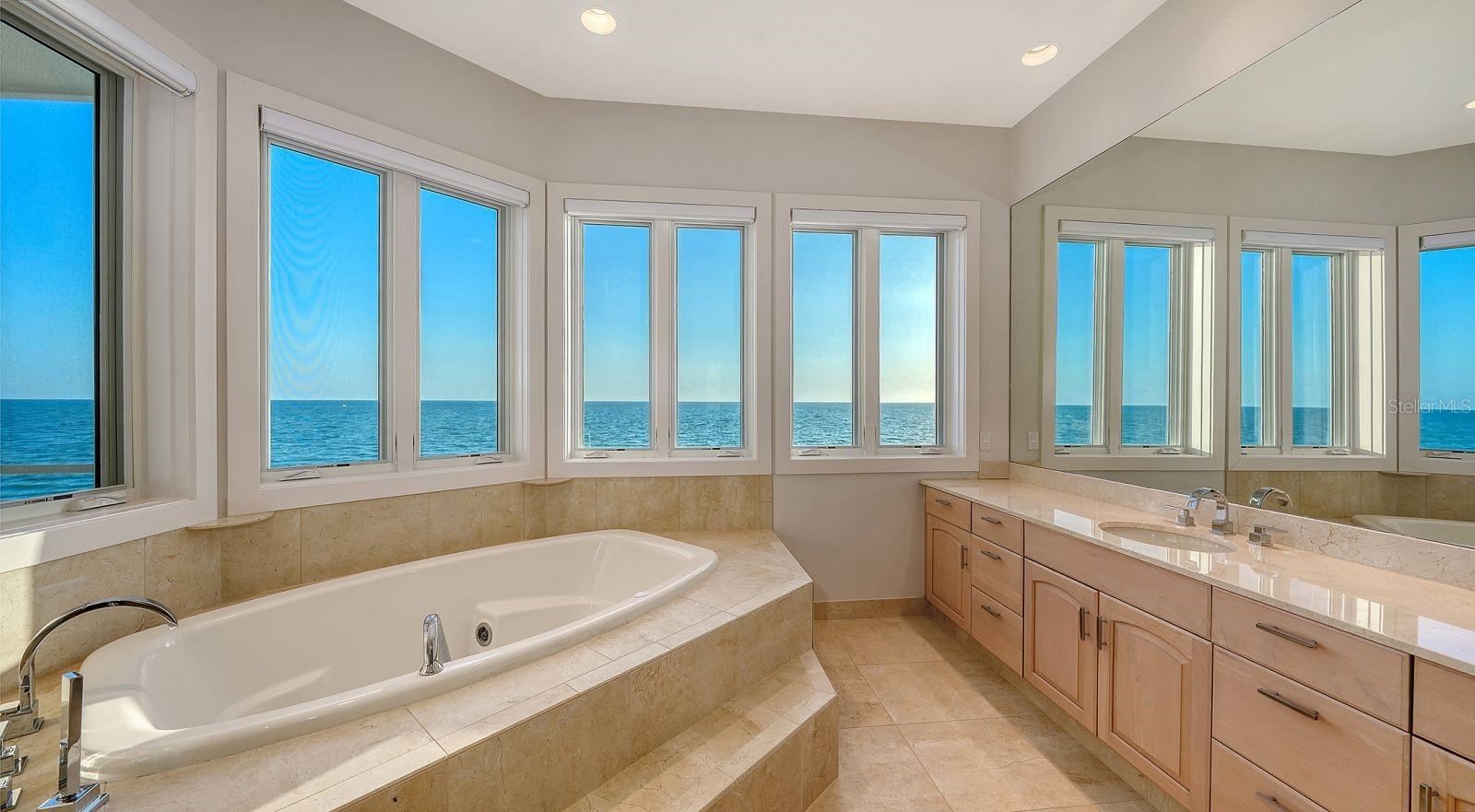 Primary bath offers separate vanities