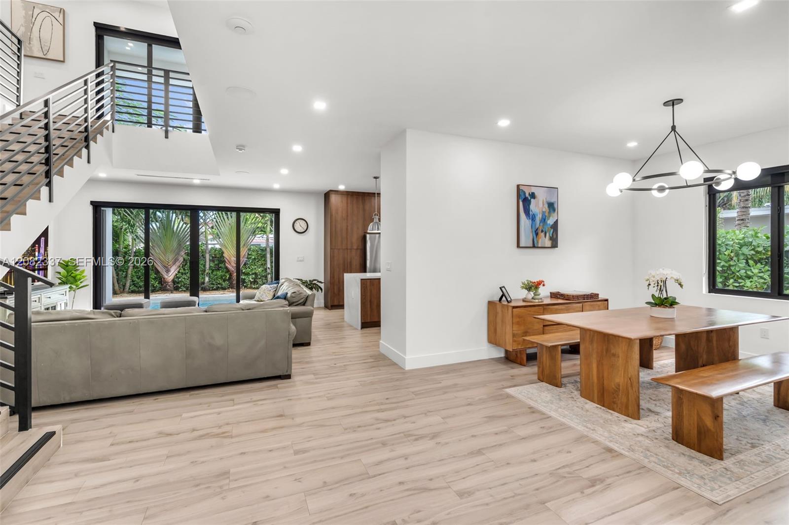 View of dining and living areas from the entrance