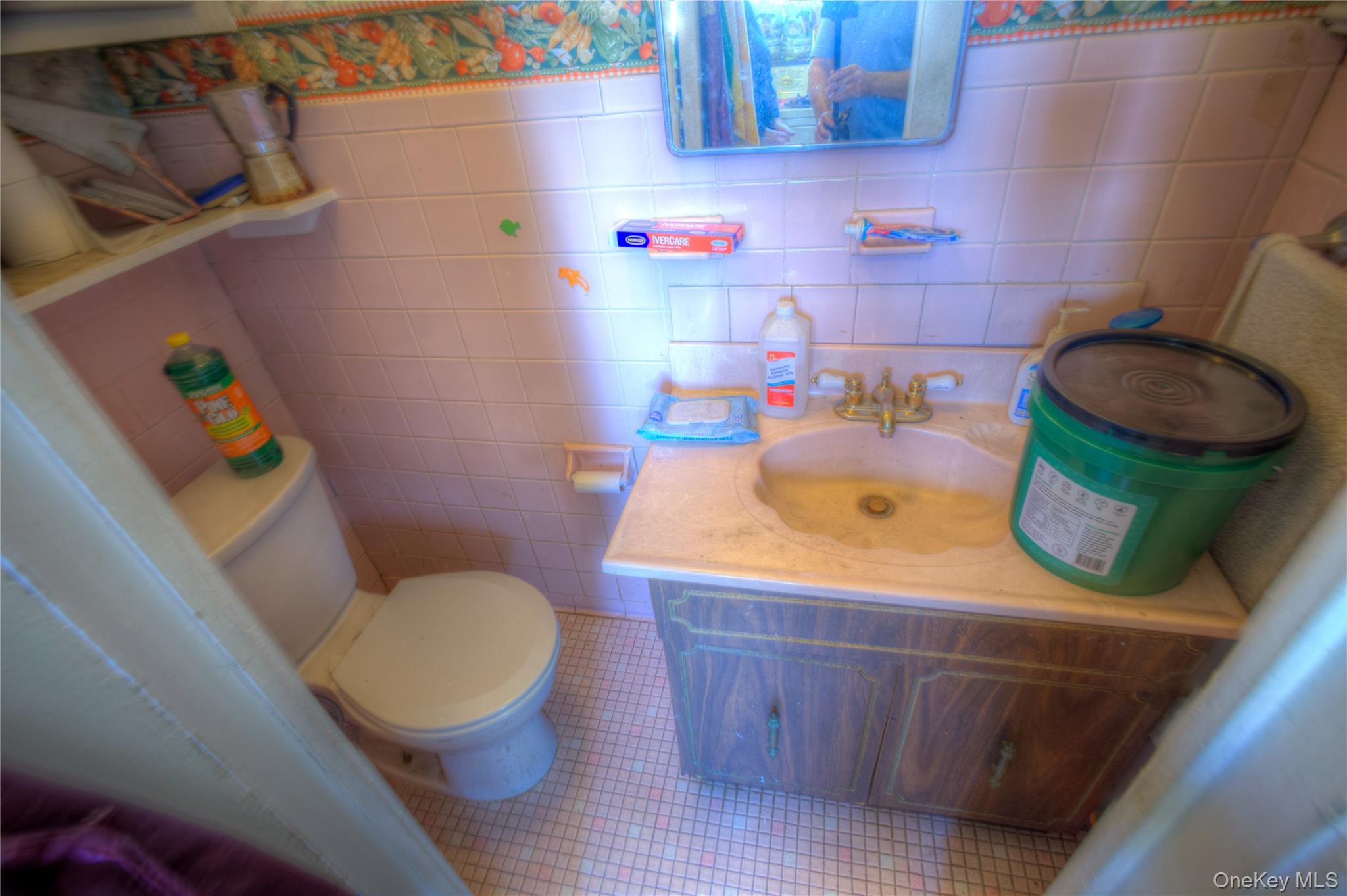 1/2 Bath between Kitchen and Enclosed Porch