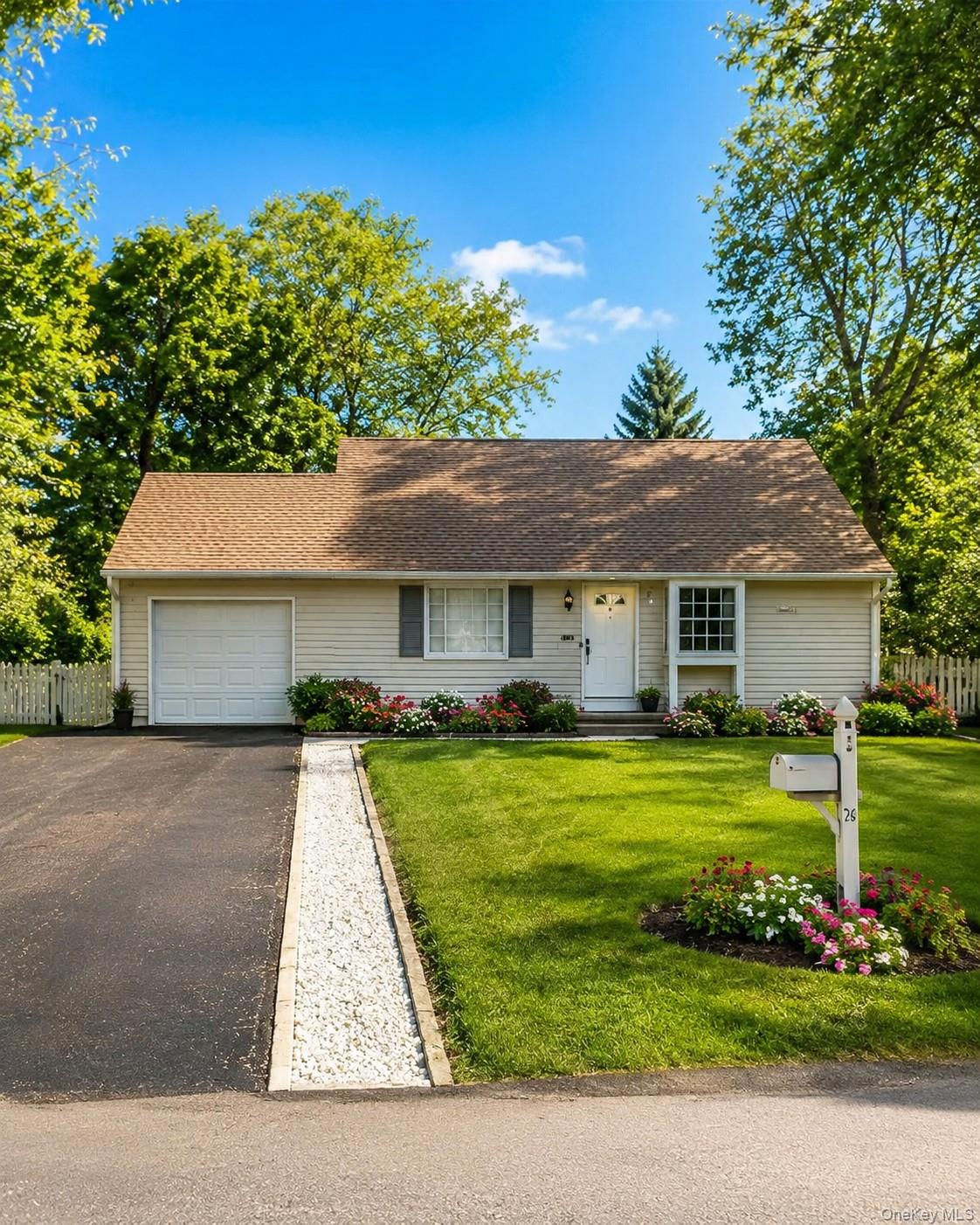 Single-story residence featuring light-colored siding and a brown shingle roof photos have been digitally enhanced to illustrate the property's poten