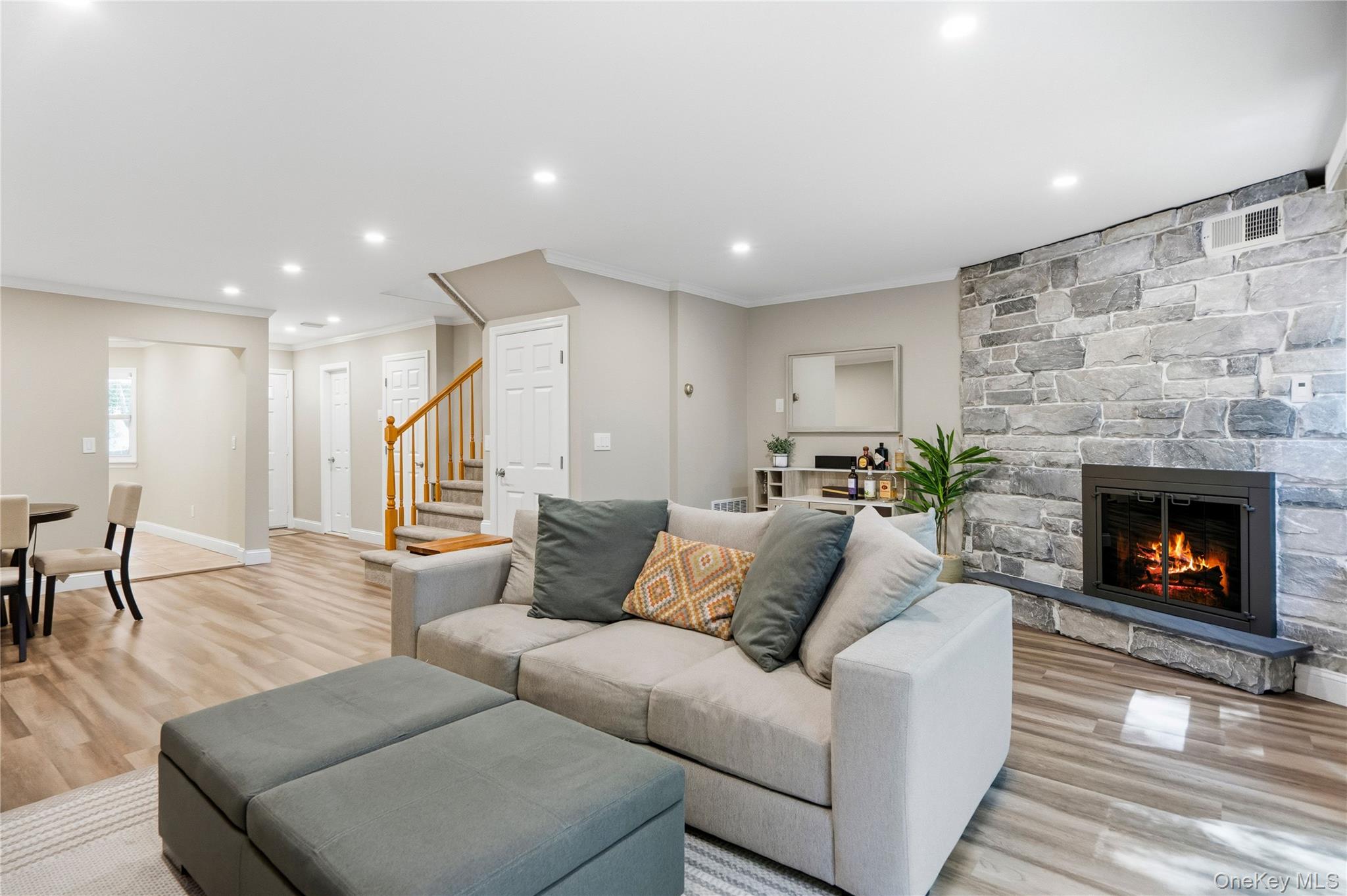 View of living room towards kitchen and entry